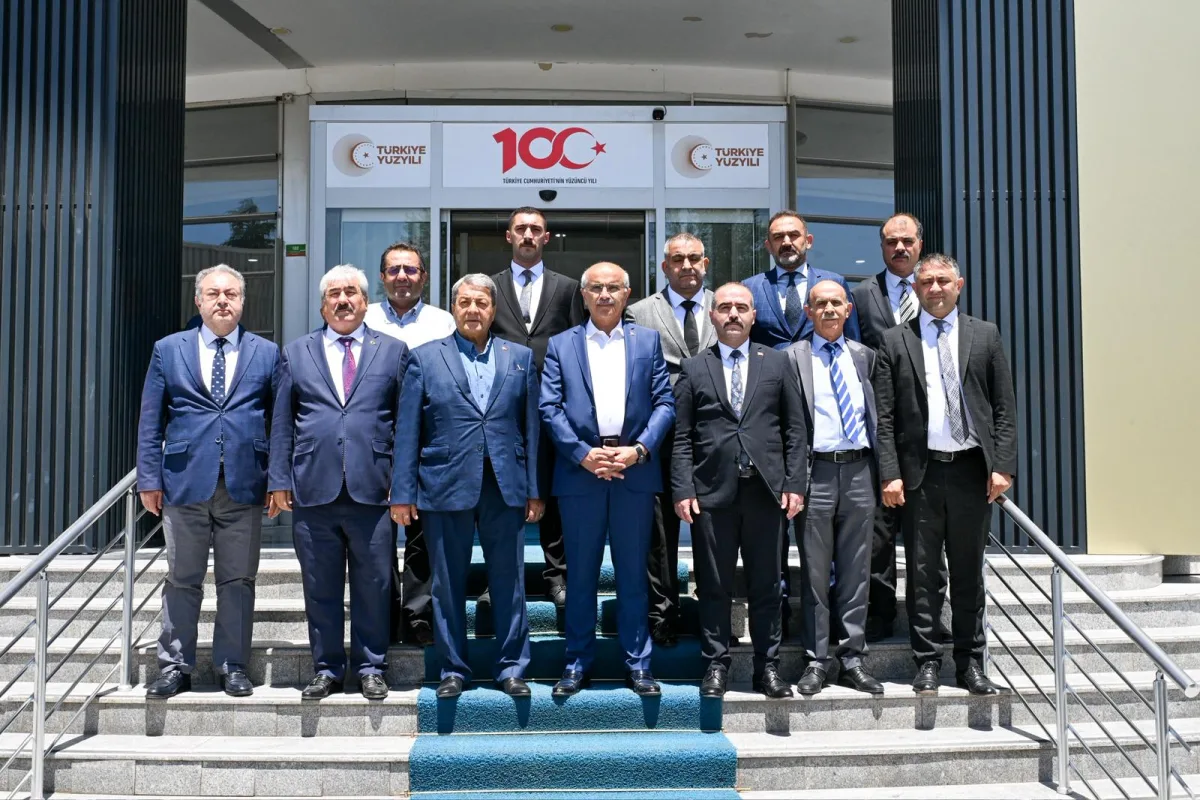 MHP Heyetinden Büyükşehir Belediye Başkanı Sami Er'e Ziyaret 